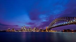 黄昏时华丽悉尼歌剧院与悉尼大桥风景壁纸
